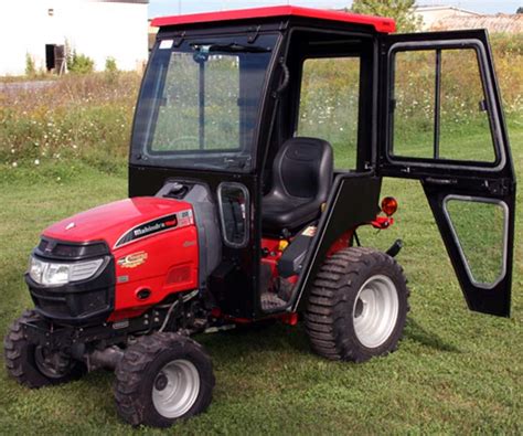 65 hp Shuttle shift 12 Forward 12 reverse air-conditioning and heating Kenwood radio One remote in rear Telescoping three point hitch arms. . Aftermarket cabs for mahindra tractors